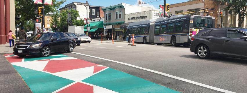 Red, green and white painted crosswalks on Commercial Drive