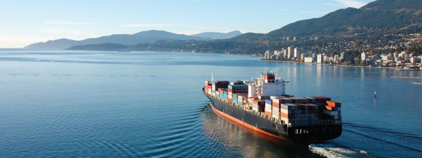 LNG cargo ship sails west through Vancouver's harbour 