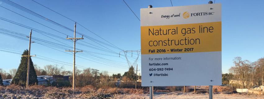 Natural gas line construction sign along right of way