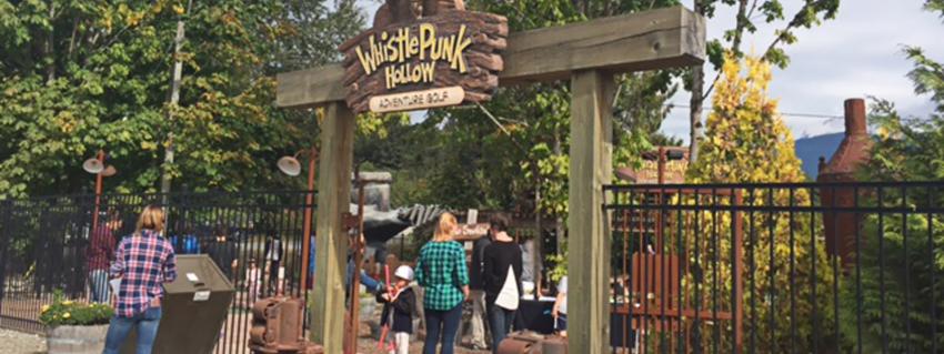 Entrance to Whistle Punk Hollow adventure golf course