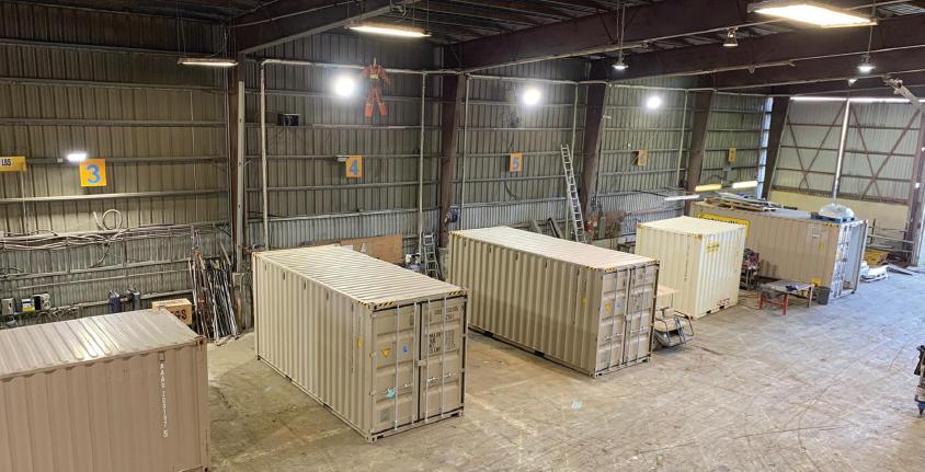 Shipping containers in a warehouse