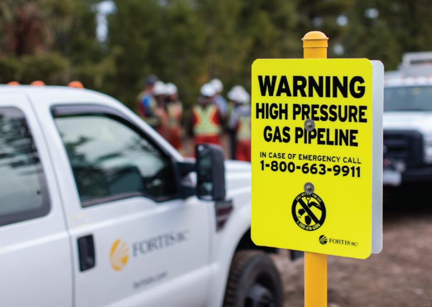 Sign reads Warning high pressure gas pipeline