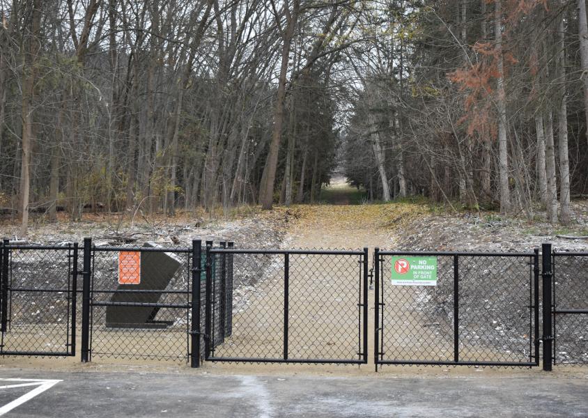 The new dog gate installed at the edge of the Carlson Park parking lot