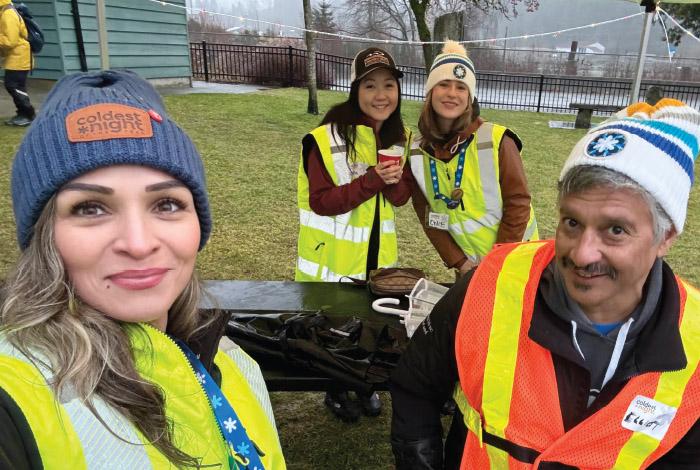 EGP Project team members warm up with a hot chocolate at the Coldest Night of the Year walk in Squamish.