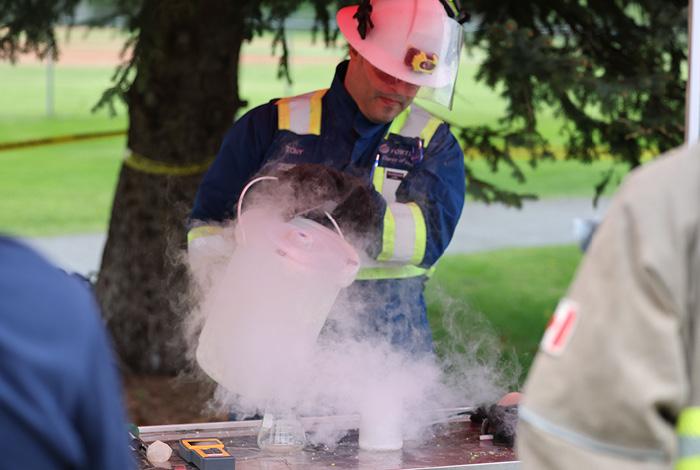 FortisBC LNG advisor, Tony Goncalves conducting a demonstration of the properties of liquefied natural gas (LNG) in Delta, B.C.