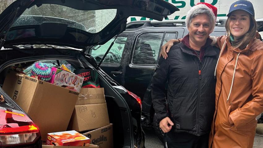 Elliot Moses and Chloe Finn of FortisBC's EGP Project team, ready to deliver gift hampers to residents in Squamish.