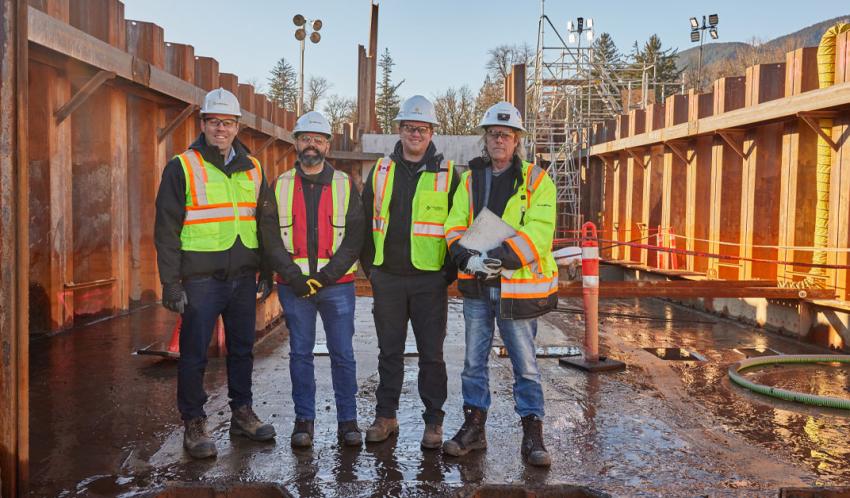 (L to R) Darrin Marshall, EGP Project Director, Ignacio Calvo González, Tunnel Senior Project Manager, Todd Lewis, EGP Environment Manager and Steve Skelhorn, EGP Tunnel Construction Manager, at the mouth of the tunnel ramp in Squamish.
